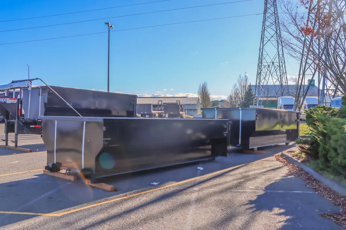 Roll-off dumpster ready for waste disposal at job site for 4 Yard Dumpster Rental in Lindale
